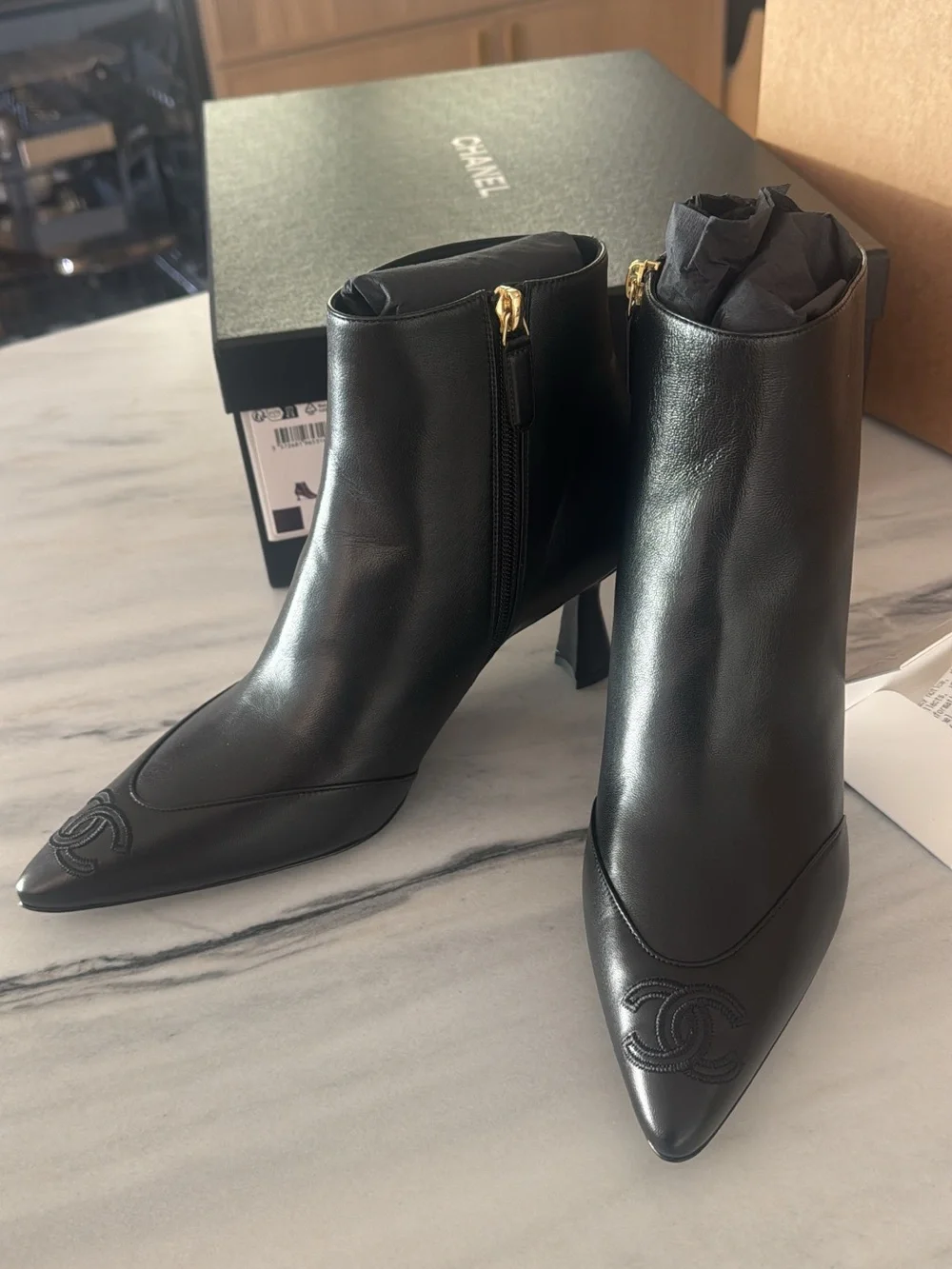 CHANEL Black Leather Pointed Ankle Boots with Sculpted Heel